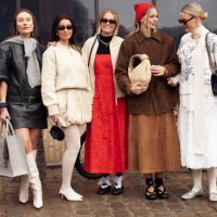 Benthe Liem, Hollie Mercedes Peters and Sonja Leigh poses outside the Munthe fashion show during the Copenhagen Fashion Week Autumn/Winter 2025 on...