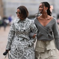Benthe Liem seen wearing silver Celine sunnies, waist tailored Dior print coat with matching Dior Saddle bag and black Adidas Gazelle sneakers, Amaka...