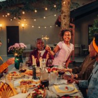 big family garden party celebration, gathered together at the dining table outdoors - garden decoration stock pictures, royalty-free photos & images