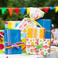 birthday present on garden table - garden decoration stock pictures, royalty-free photos & images