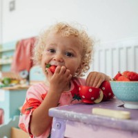 biting into a strawberry - food stock pictures, royalty-free photos & images