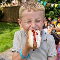 biting into delicious hot dog - junk food stock pictures, royalty-free photos & images