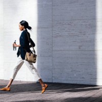 black businesswoman walking in the city with confidence - fashion stock pictures, royalty-free photos & images