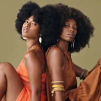 black women, afro hair and fashion clothes on studio background in pride and feminine empowerment. portrait, confident or beauty model friends with style, trend or cool hairstyle and clothing - fashion stock pictures, royalty