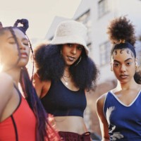 black women, street style and fashion hairstyle with friends standing outside in urban city or ghetto looking trendy and fierce. portrait of stylish females showing beauty and attitude in atlanta - fashion stock pictures, roy