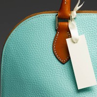 blank tag on handbag - fashion stock pictures, royalty-free photos & images