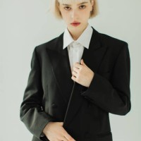 blonde woman in black suit in studio. fashion model. - fashion stock pictures, royalty-free photos & images