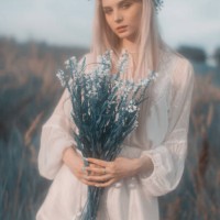 blonde woman in the meadow. flower wreath - garden decoration stock pictures, royalty-free photos & images