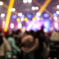 blurred background image of people enjoying music at night celebrate christmas party - concert stock pictures, royalty-free photos & images