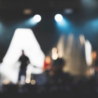 blurred image of a rock concert. unrecognizable people on the stage - concert stock pictures, royalty-free photos & images