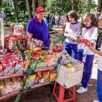 Bogota, Colombia, Jardin Botanico de Bogota, Jose Celestino Mutis Botanical Garden, snack food vendor selling to students on field trip.