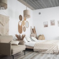 boho-chic bedroom with neutral tones and natural textures - home decoration stock pictures, royalty-free photos & images