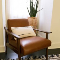 boho chic leather chair with midcentury modern style in stylish living room home interior - home decoration stock pictures, royalty-free photos & images