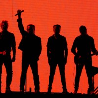 Bono and Adam Clayton of U2 perform on stage during 'U2 The Joshua Tree Tour 2019' at the Gocheok Sky Dome on December 08, 2019 in Seoul, South Korea.