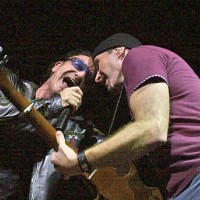 Bono and The Edge perform on stage in the U2 Concert at Earls Court on August 19, 2001 in London.
