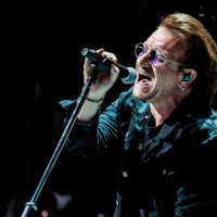 Bono of U2 performs on stage at Mediolanum Forum on October 12, 2018 in Milan, Italy.