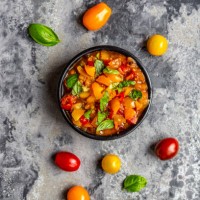 bowl of tomato basil dip - junk food stockfoto's en -beelden