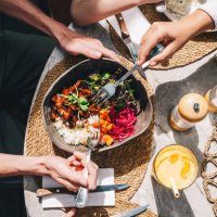 bowl with healthy food. fresh vegetables, beef and rice in a big plate. sunny day, serving a meal in a cafe. - food stock pictures, royalty-free photos & images