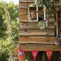 boy in a treehouse - garden decoration stock pictures, royalty-free photos & images