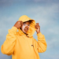 boy with vitiligo wearing yellow hoodie - fashion stock pictures, royalty-free photos & images