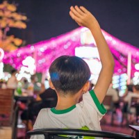 boys watch outdoor singing performances. - concert stock pictures, royalty-free photos & images