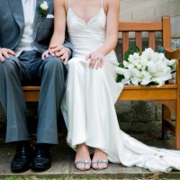 bride and groom on bench - home decoration stock pictures, royalty-free photos & images