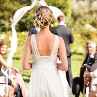 bride walking down the aisle during wedding ceremony - hairstyle stockfoto's en -beelden