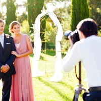 bridesmaid and best man posing for photographer - garden decoration stock pictures, royalty-free photos & images