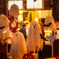 bright, spooky city store decorated for halloween. street decoration. scary ghosts window, bat, web - home decoration stock pictures, royalty-free photos & images