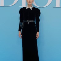 British actress and producer Rosamund Pike poses upon arrival ahead of Dior Women Ready-to-wear Spring-Summer 2025 show as part of the Paris Fashion...