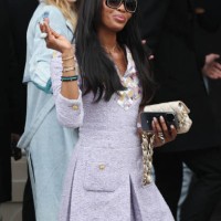 British super model Naomi Campbell waves as she arrives to attend the presentation by Chanel for the Womenswear Ready-to-wear Fall-Winter 2025/2026...