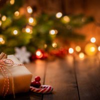 brown christmas gift box on rustic wooden table. - home decoration stock pictures, royalty-free photos & images