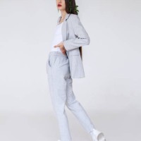 brunette in suit with twigs in hair - fashion stock pictures, royalty-free photos & images