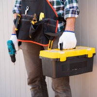 builder handyman with drill and construction tools. - home decoration stock pictures, royalty-free photos & images