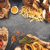 bunch of food ready to eat - junk food stock pictures, royalty-free photos & images