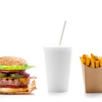 burger combo with take away beverage glass strawn and disposable french fries in kraft paper box isolated on white - junk food stock pictures, royalty-free photos & images