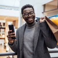 business man in a shopping center - fashion stock pictures, royalty-free photos & images