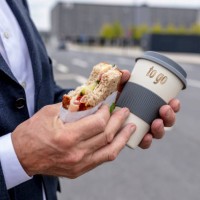 business man is eating while lunch break on the go - junk food stock pictures, royalty-free photos & images