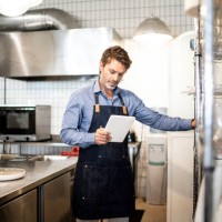 business owner checking kitchen supplies - food stock pictures, royalty-free photos & images