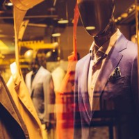 business suits in display window - fashion stock pictures, royalty-free photos & images