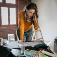 business woman making important business call - home decoration stock pictures, royalty-free photos & images