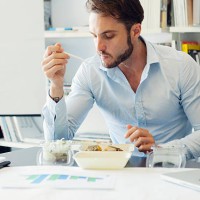 businessman have lunch break in office. - junk food stock pictures, royalty-free photos & images