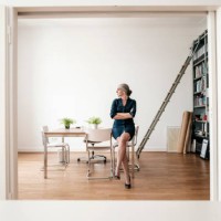businesswoman sitting in modern office - fashion stock pictures, royalty-free photos & images