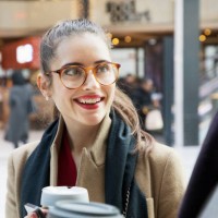 businesswoman walking with colleague through departure lounge. - junk food stock pictures, royalty-free photos & images