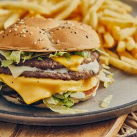 cafeteria double beef burger gourmet - junk food stock pictures, royalty-free photos & images