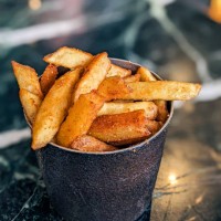 cajun seasoned french fries - junk food stock pictures, royalty-free photos & images