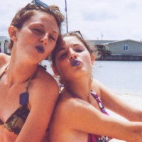 candid portrait of best friends on vacation 1990s 2000s y2k vintage photo of sunscreen women - fashion stock pictures, royalty-free photos & images