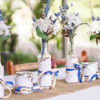 candlestick and flower arrangement on table - garden decoration stock pictures, royalty-free photos & images