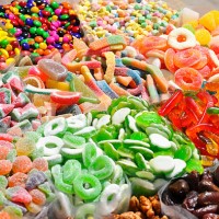 candy in bright sunlight - junk food stock pictures, royalty-free photos & images