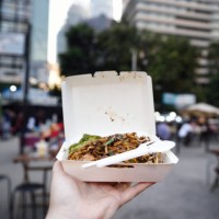 carboard take away box of malaysian char kway teow at a market - junk food stock pictures, royalty-free photos & images